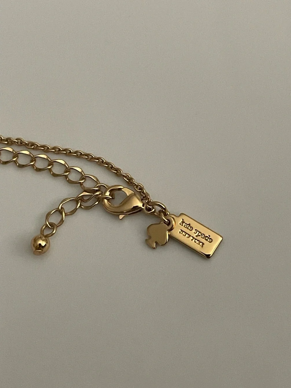 Kate Spade ♠️ Gold Circular Spade Pendant Necklace with Crystal Drtail